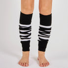 Woman wearing Mysocks black and white striped 100% acrylic leg warmers