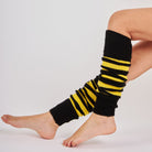 Woman wearing Mysocks yellow and black striped knit leg warmers