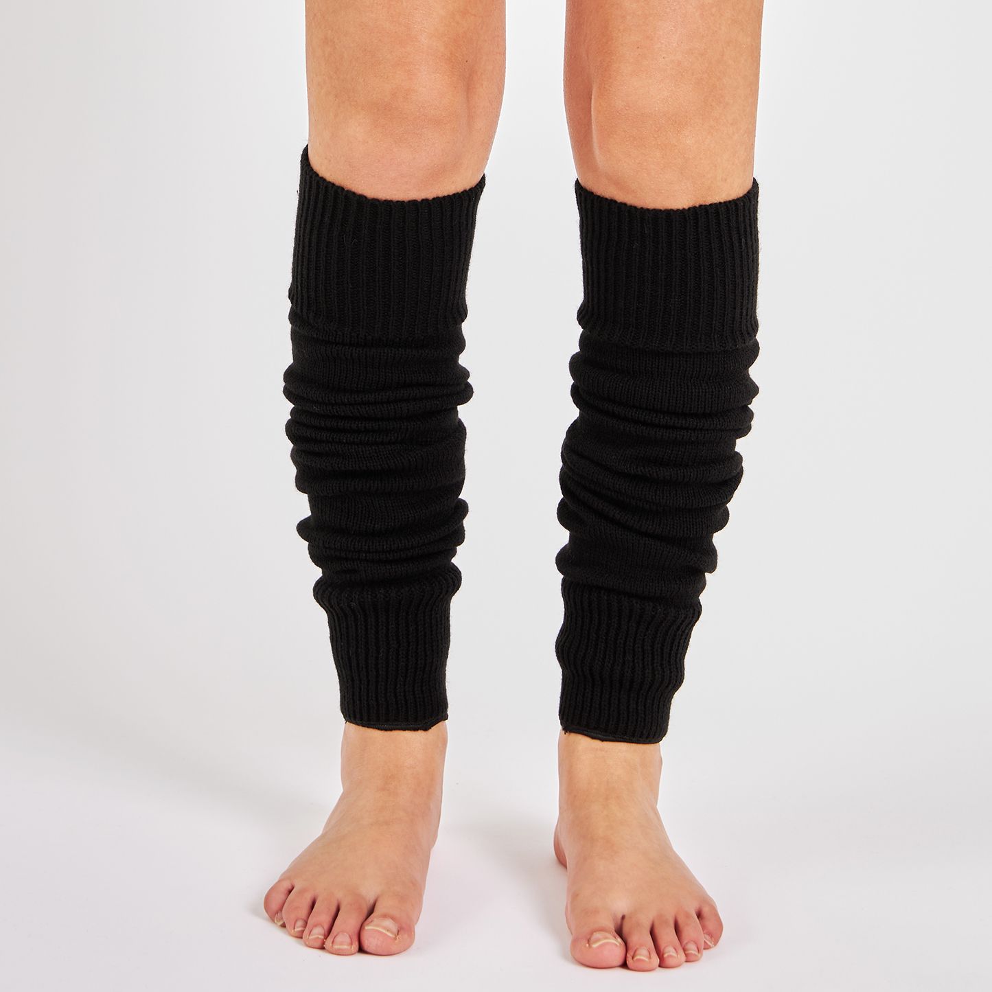 Woman wearing Mysocks plain black 100% acrylic leg warmers
