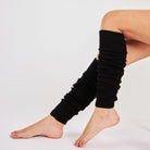 Woman wearing Mysocks plain black 100% acrylic leg warmers